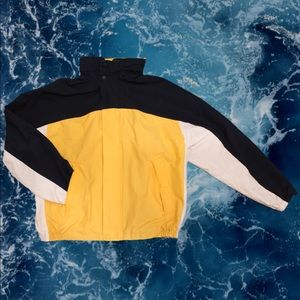 Vintage Nautica yellow windbreaker jacket
With retro Nautica logo on the back